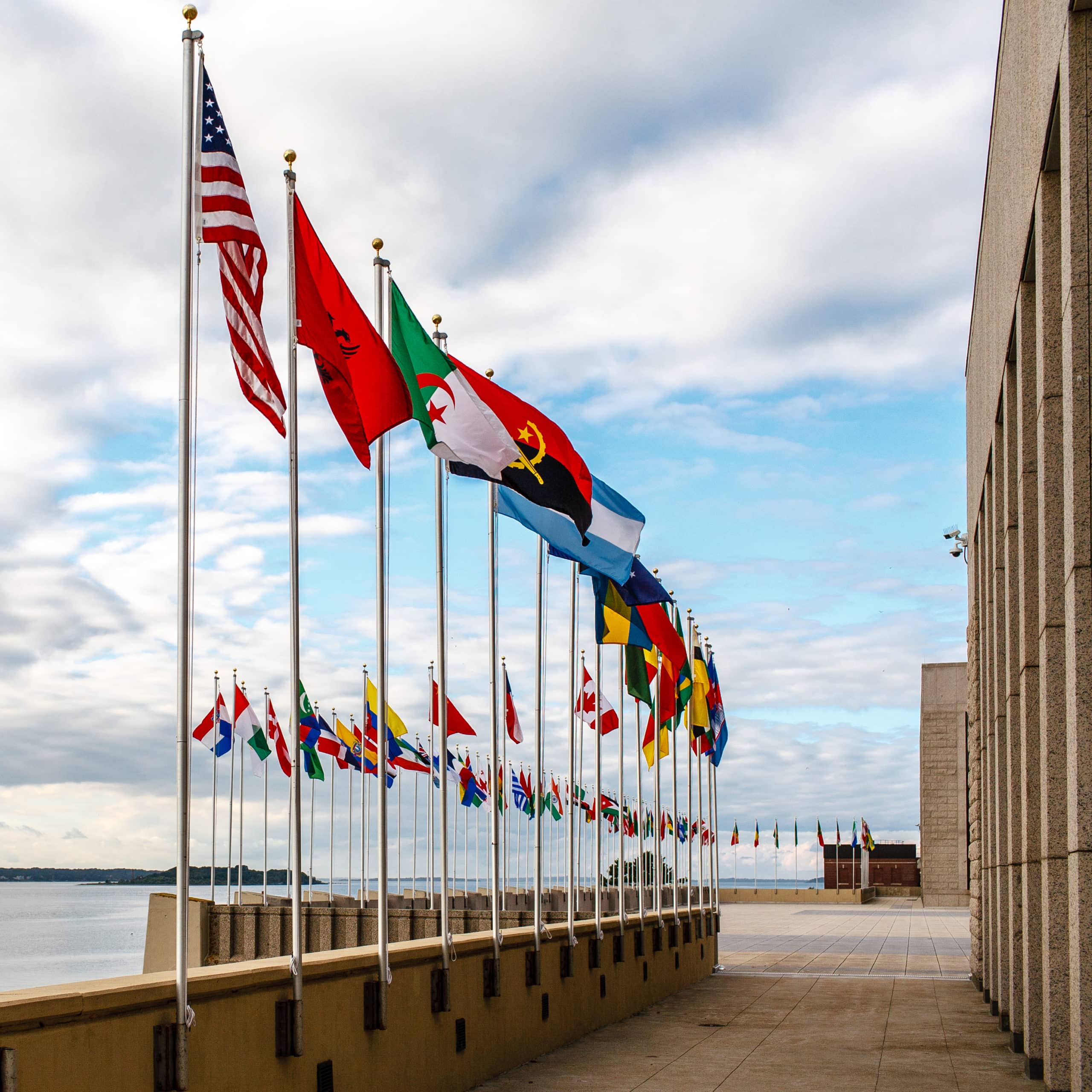 International flags fly at Colbert Plaza at the Naval War College